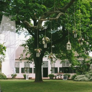 Outdoor Decor Draping And Hanging Candles and Flowers