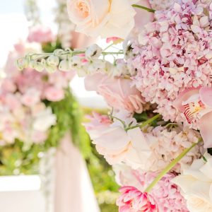 Close up of Floral Arches Pastel Pinks Hydrangeas Orchids Roses Tulips Delphinium
