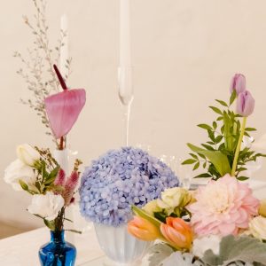 My Pretty Vintage Wedding Décor and Floral Stylist & Wedding Hire. Classic White Vases with blue hydrangeas and Pink Tulips