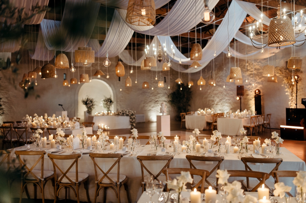My Pretty Vintage Paarl Wedding Event Décor Hire: Ceiling Draping, Bridal Tablescape with White Flower Filled Urns and Arch Backdrop, Table Décor, Candle Decoration, Green White Roses, White Irisis, White Chrysanthanums, White Chinks, and Gypsophila