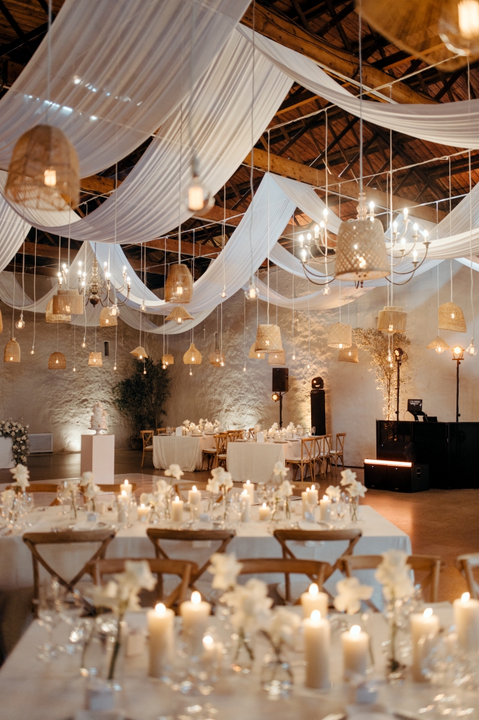 My Pretty Vintage Paarl Wedding Event Décor Hire: Ceiling Draping, Bridal Tablescape with White Flower Filled Urns and Arch Backdrop, Table Décor, Candle Decoration, Green White Roses, White Irisis, White Chrysanthanums, White Chinks, and Gypsophila