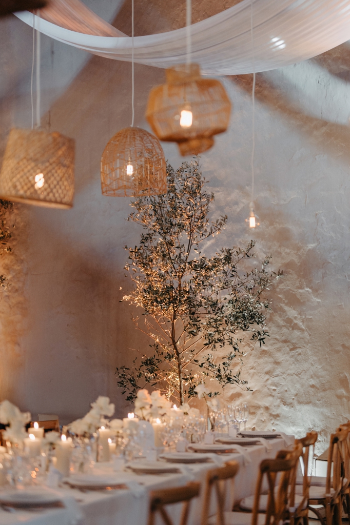 My Pretty Vintage Paarl Wedding Event Décor Hire: Ceiling Draping, Bridal Tablescape with White Flower Filled Urns and Arch Backdrop, Table Décor, Candle Decoration, Green White Roses, White Irisis, White Chrysanthanums, White Chinks, and Gypsophila